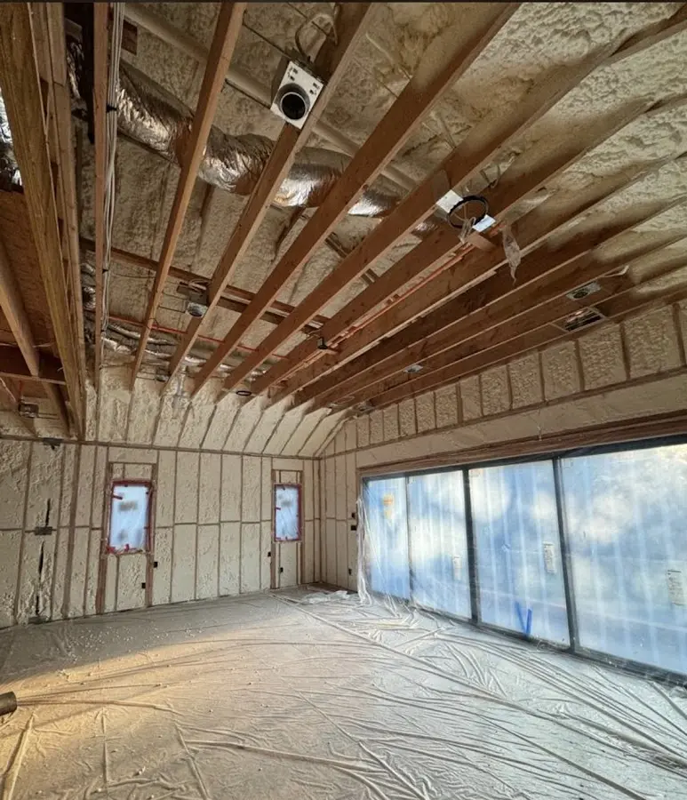Interior walls and ceiling insulated with spray foam during new construction in Creston